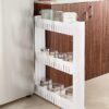Amazon Basics Slim Rolling Storage Rack 3-Tiered Shelf Plastic Slide-Out Organizer | Space-Saving, Multipurpose | for Kitchen, Bathroom, Laundry, Pantry & Utility Storage | Floor Standing | White Amazon Basics Slim Rolling Storage Rack 3-Tiered Shelf Plastic Slide-Out Organizer | Space-Saving, Multipurpose | for Kitchen, Bathroom, Laundry, Pantry & Utility Storage | Floor Standing | White