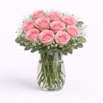The FloralMart Glass Vase Arrangement of 10 Pink RosesBest Amazon Deals
